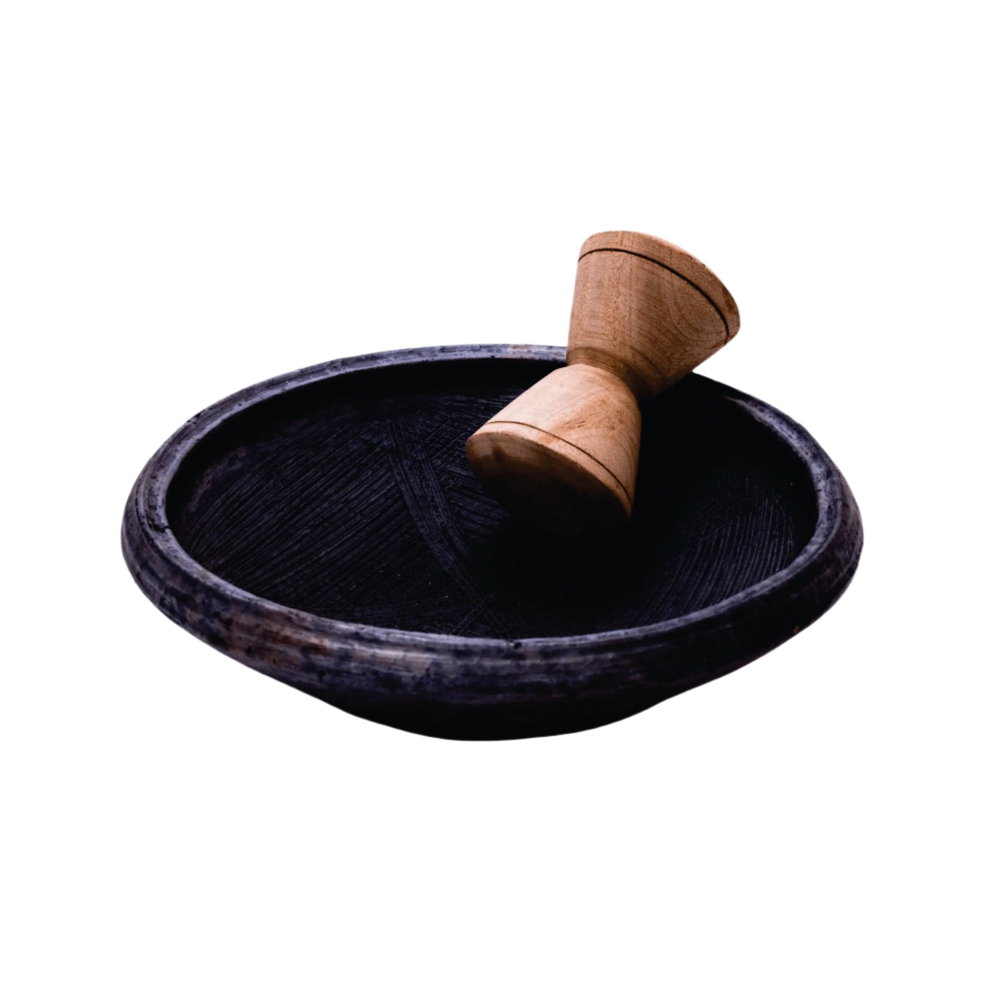 Asanka with wooden grinder